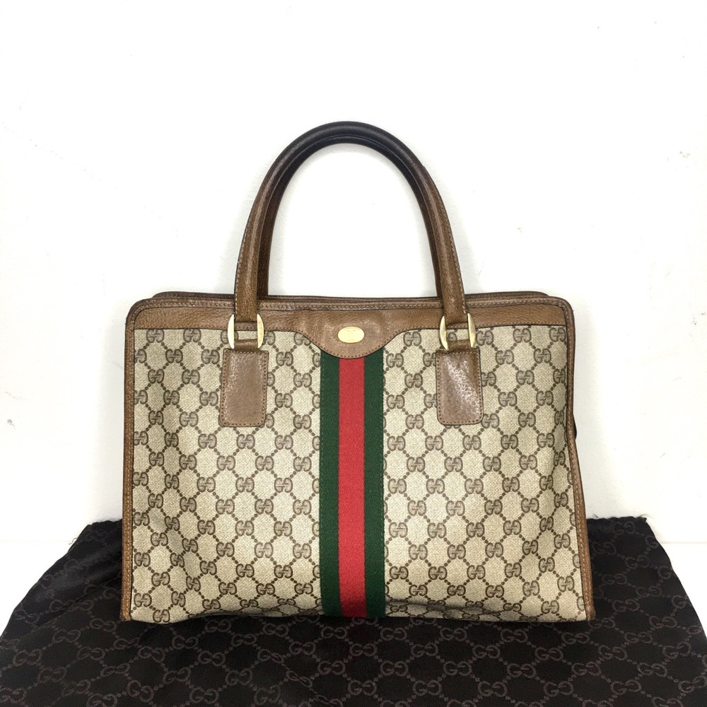 Authentic Gucci brown monogram satchel bag